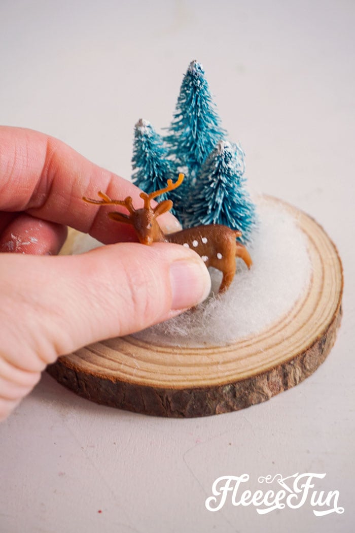 gluing the reindeer in place