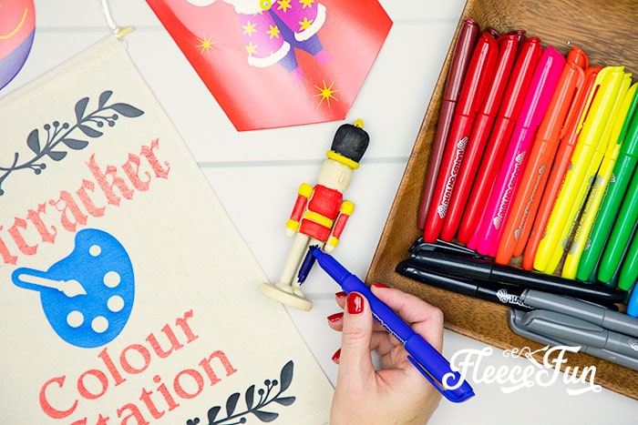 This Nutcracker Ornament DIY is easy and fun for all ages. Set up is perfect for a party and everyone can let their creativity shine with this tutorial!