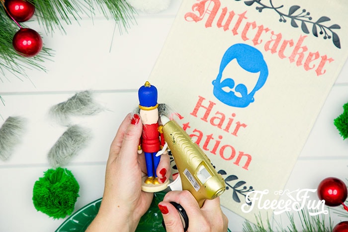 This Nutcracker Ornament DIY is easy and fun for all ages. Set up is perfect for a party and everyone can let their creativity shine with this tutorial!