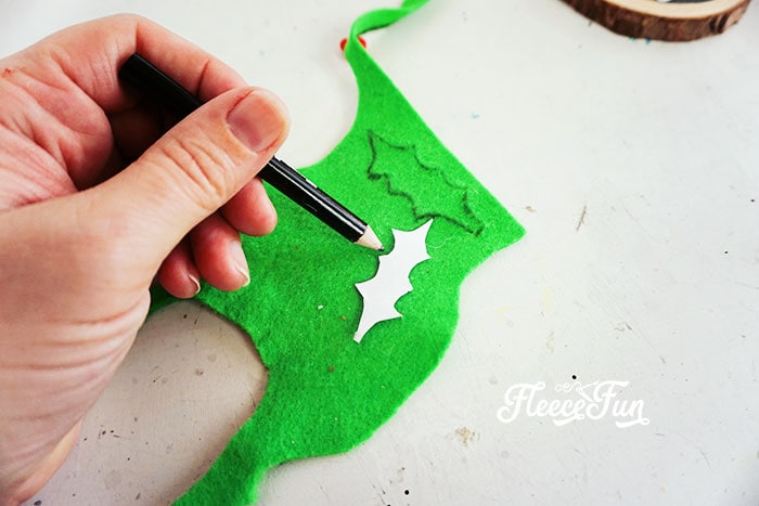 Shaping holly leaves for DIY wood Christmas ornament, following fleecefun tutorial