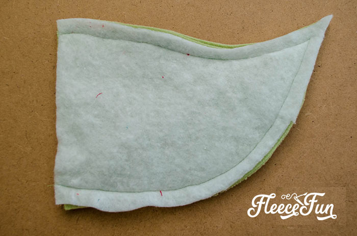 Sewing Baby Yoda ears with fleecefun’s free pattern guide.