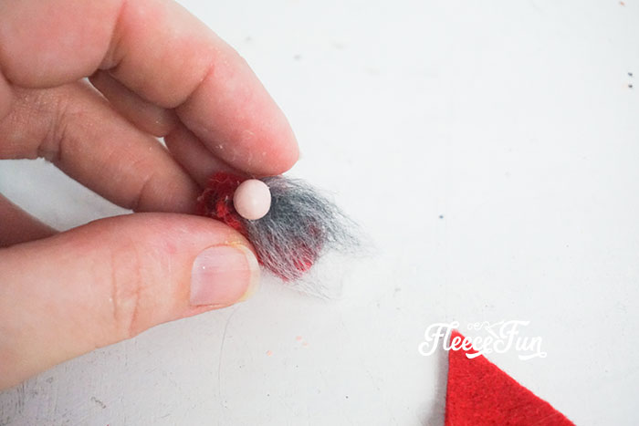 gluing the fur in place