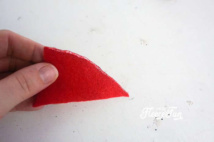 Adding a DIY gnome to a holiday ornament following fleecefun’s free guide