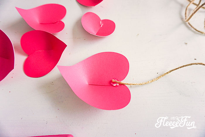 Prepare rustic hearts for hanging with fleecefun's free template and step-by-step guide.