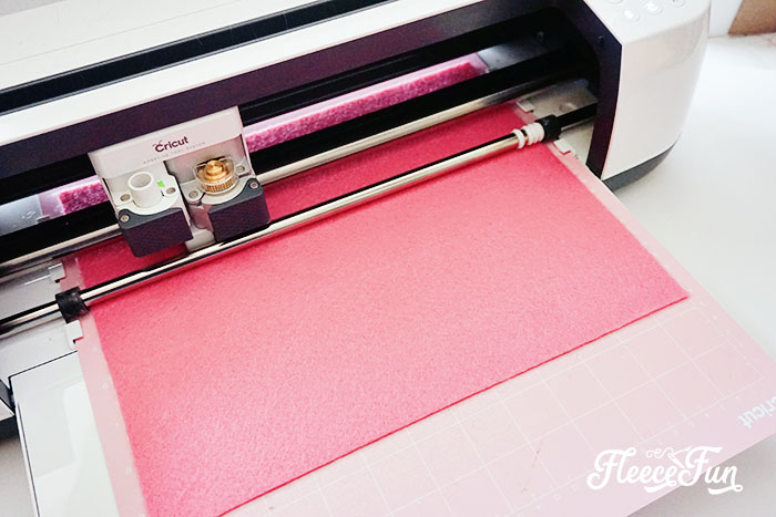 Paper hearts cut for a Valentine Tree using fleecefun free template and tutorial.