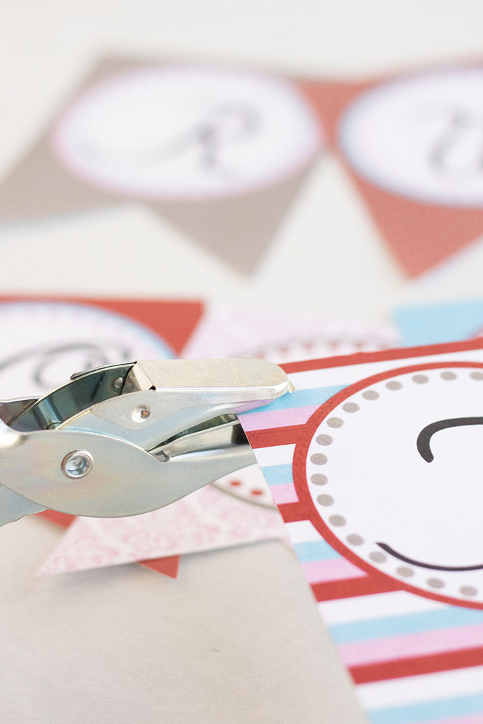 Assembling the "True Love" Valentine's banner with fleecefun free printable and tutorial