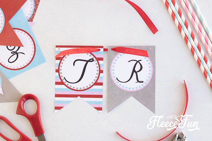 Valentine's banner completed with ribbon detailing using fleecefun tutorial