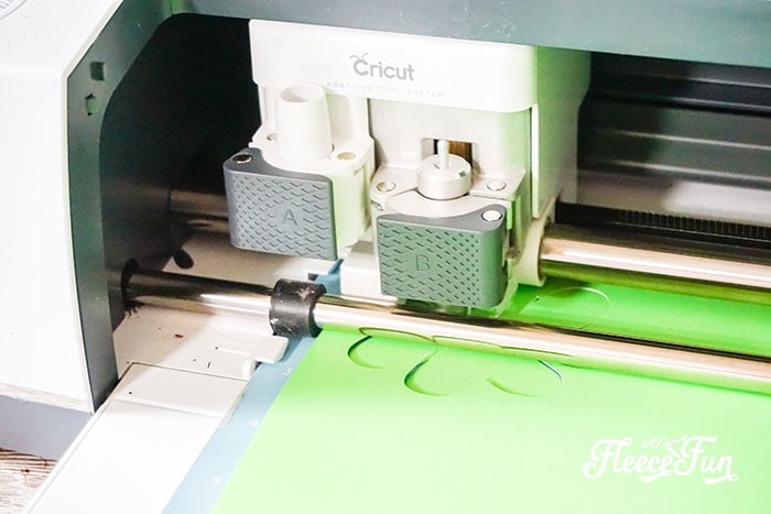 Use your Cricut to cut perfect lucky clovers for your shadow box with fleecefun’s free template and tutorial.