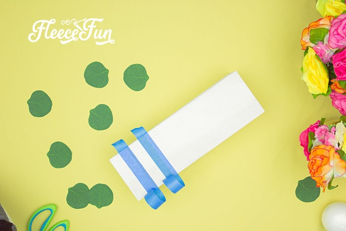Step-by-step guide to painting bold stripes on an Easter centerpiece – fleecefun tutorial