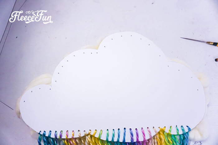 Assembling the colorful rainbow for your nursery wall hanging with fleecefun free guide