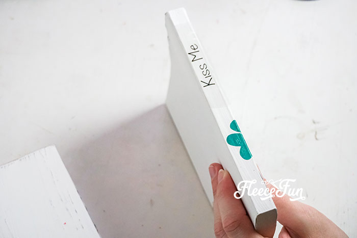 affixing the lettering on the books