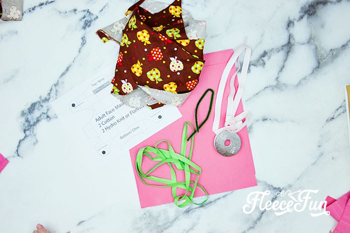The PDF pattern and materials needed. Fitted Face Mask DIY (Sizes Child to Adult) is a tutorial to show you how to make a facial covering to help slow the spread of germs. With Free PDF Pattern and SVG Files.
