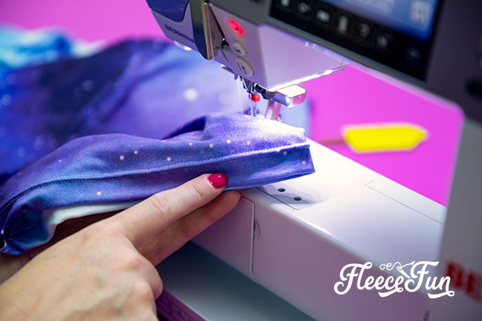 Adding the final touches to DIY shorts using fleecefun’s free pattern and tutorial