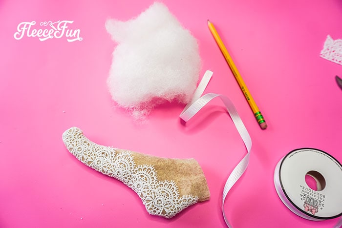 stuffin and turned ornament. This delicate Ballet Slipper Handmade Ornament Tutorial is inspired by the Nutcracker Suite! Free PDF pattern and SVG file with step by step directions.