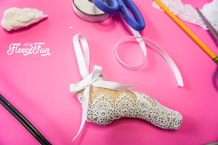 Completed Ornament. This delicate Ballet Slipper Handmade Ornament Tutorial is inspired by the Nutcracker Suite! Free PDF pattern and SVG file with step by step directions.