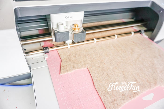 Felt pieces and materials ready for cutting to start the Ballet Slipper ornament with fleecefun's free template and tutorial.