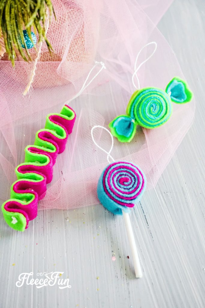 Handmade felt candy ornaments for your Christmas tree, created with a free tutorial from fleecefun.