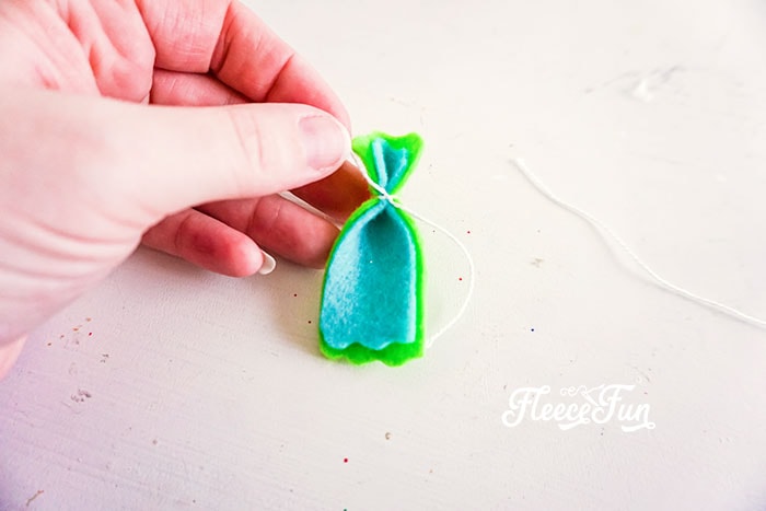 felt with end tied. I love the look of these DIY Felt Candy Christmas Tree Ornaments.   Fast to make, they add a little whimsy and fun to your tree - while not adding calories to your waistline.