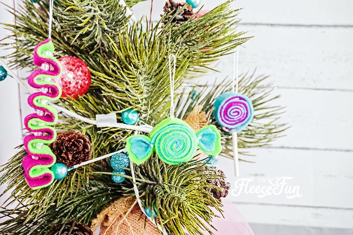 I love the look of these DIY Felt Candy Christmas Tree Ornaments.   Fast to make, they add a little whimsy and fun to your tree - while not adding calories to your waistline.