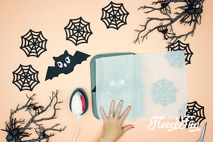 Use fleecefun's tutorial to attach eyes to your Halloween bat garland.