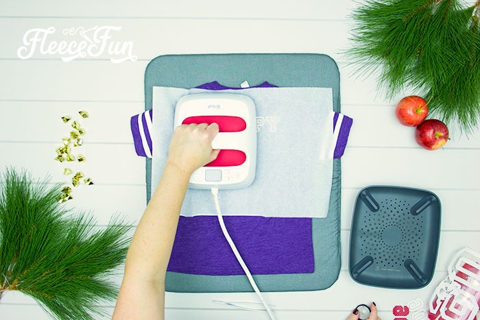 using easy press. Learn the tips for working with Iron on Mesh! This fun product gives a cute "Sports Jersey" look, but has a few things to watch out for. With free design space file from FleeceFun