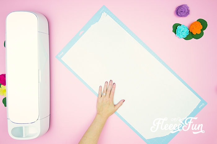 Paper on mat.Making a freezer paper stencil for T-shirts is easy with this step by step tutorial! Included are tips & tricks to help you have success with your project.