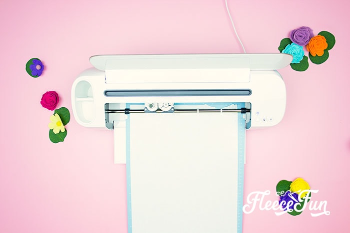 Cricut cutting paper. Making a freezer paper stencil for T-shirts is easy with this step by step tutorial! Included are tips & tricks to help you have success with your project.