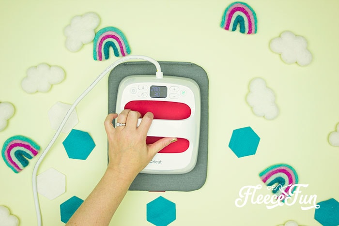 EasyPress adhering the vinyl. This Matching Game DIY is perfect for learning and made to be durable to last for several years of abuse from kids!