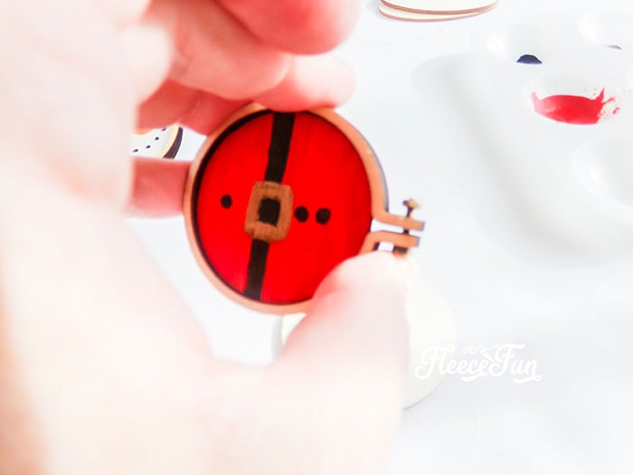 Final assembly of the Santa Christmas ornament using fleecefun free template and tutorial.