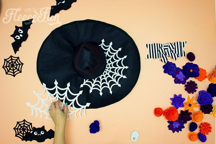 Adding decorations to witch hat. Learn how to make a witch hat with this free pdf pattern and step by step tutorial. This couture style hat is sure to be a favorite year after year.