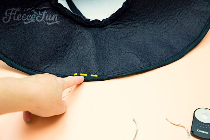 Picture showing where to sew the gap shut on the witch hat. Learn how to make a witch hat with this free pdf pattern and step by step tutorial. This couture style hat is sure to be a favorite year after year.