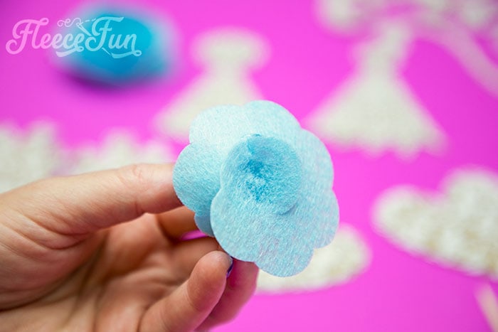 making the flowers for the party decor