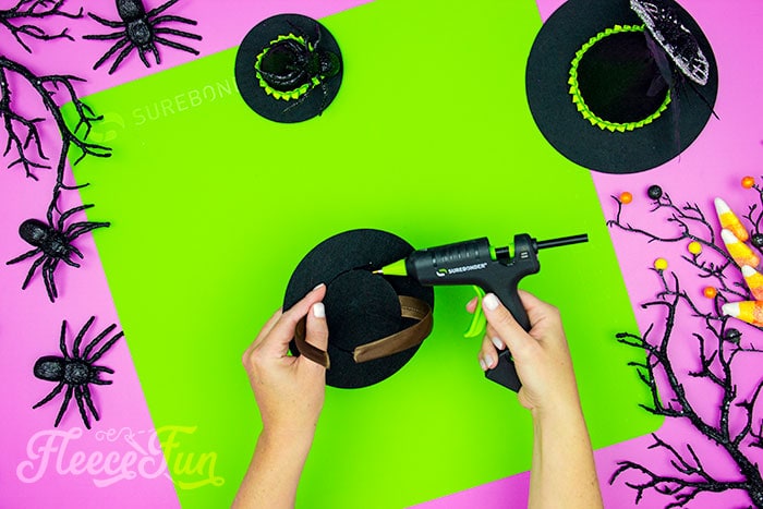 adding the headband and circle to the witch hat. This DIY Mini Witch Hat is no sew and comes with a free PDF pattern and SVG template to make it a breeze! 3 mini sizes so you can make the perfect hat!