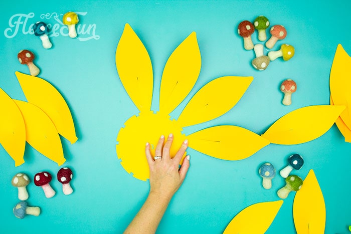 continue with next row. This Giant Paper Sunflower DIY (FREE SVG files) is perfect for fall! Make a Giant flower wall or use it to decorate your space! So many possibilities!
