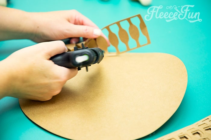 Glueig seeds inot place. This Giant Paper Sunflower DIY (FREE SVG files) is perfect for fall! Make a Giant flower wall or use it to decorate your space! So many possibilities!