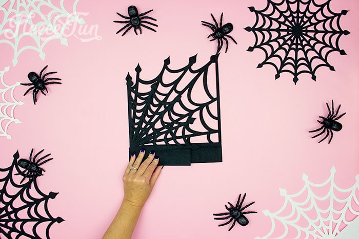 spiderweb folded in half. These Spider Web doilies Free SVG files are the perfect finishing touch to you Halloween decor!  The free SVG includes 3 designs for decorating spookiness!