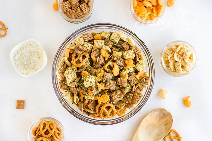 Drizzling the seasoned butter. See every crunchy step come together! This tutorial walks you through making Air Fryer Ranch Chex Mix in just 5 simple steps. Perfect for beginners or anyone craving a fast, flavorful snack that’s ready in minutes.
