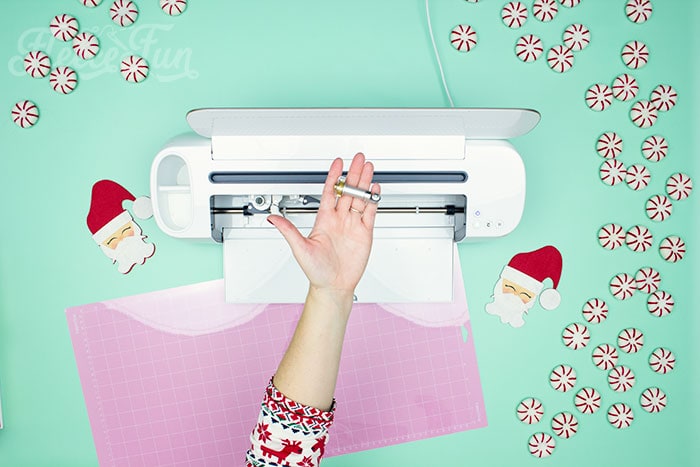 Cutting out the free felt Santa ornament pattern from fleecefun using the free template and tutorial.
