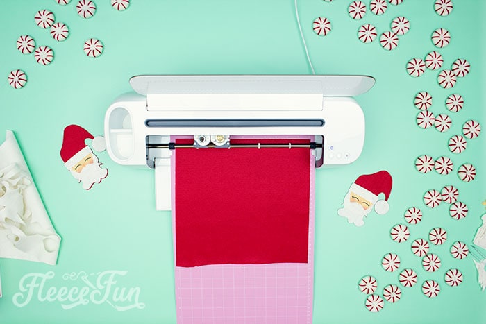 Preparing felt pieces for the Santa ornament using fleecefun's free template and tutorial.