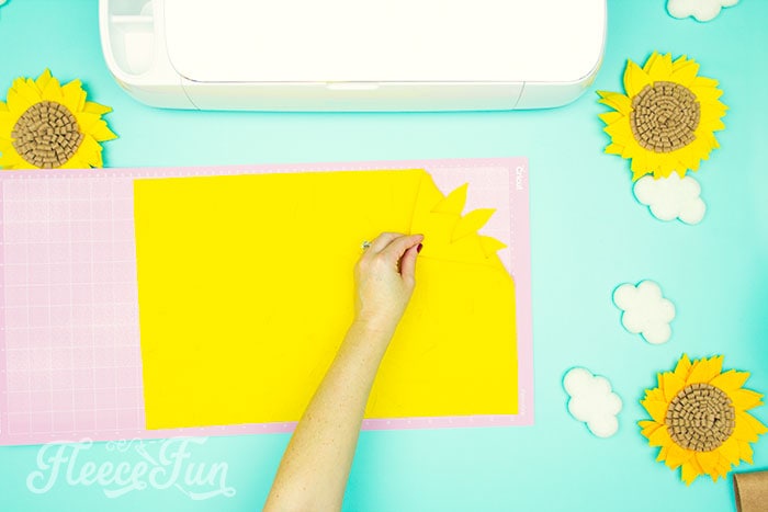 Cutting out the felt flowers for DIY project on fleecefun