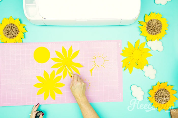 Cutting out the felt flowers for DIY project on fleecefun