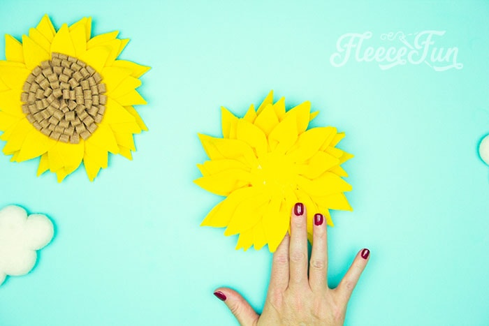 Step-by-step layering of felt sunflower craft from fleecefun