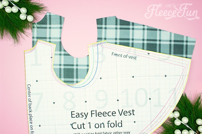 Cutting out the women's fleece vest pattern pieces using fleecefun's free template.