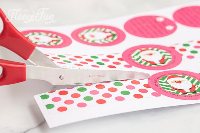 Cut out fleecefun’s free printable hot cocoa tags for mason jars
