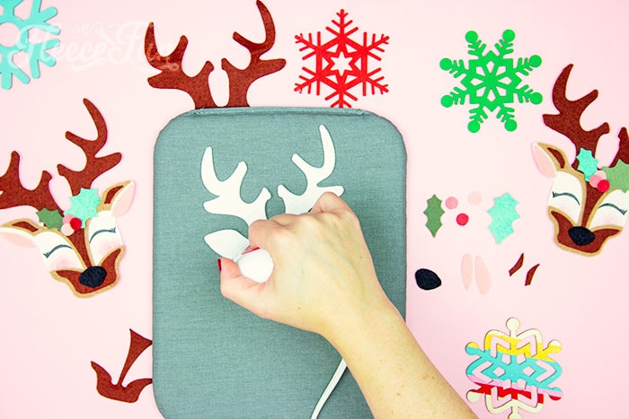 Learn how to craft the reindeer face for a handmade felt ornament with fleecefun free pattern