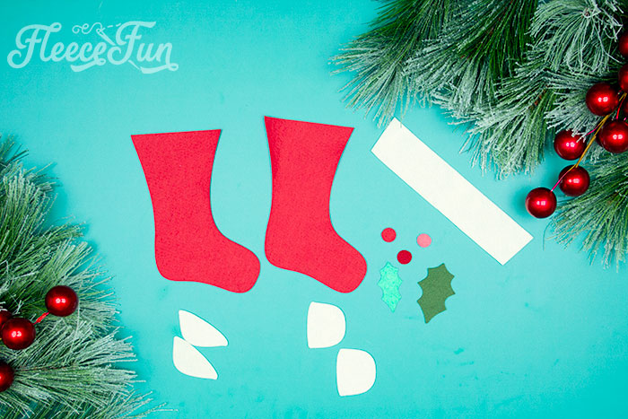 2 stockings, 1 cuff, 1-2 heels ( if you want it on both side of the stocking or not), 1- 2 toes, 1 large holly leaf and 1 small. 3 berries (in pink and red)
