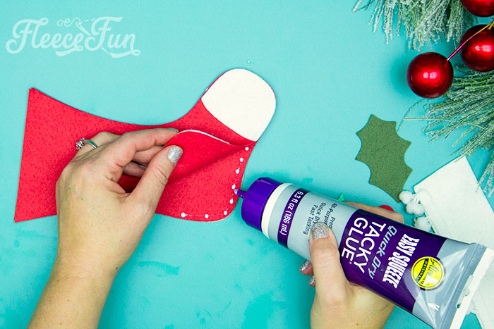 Glueing stocking together. Making a no-sew felt stocking body using fleecefun free SVG