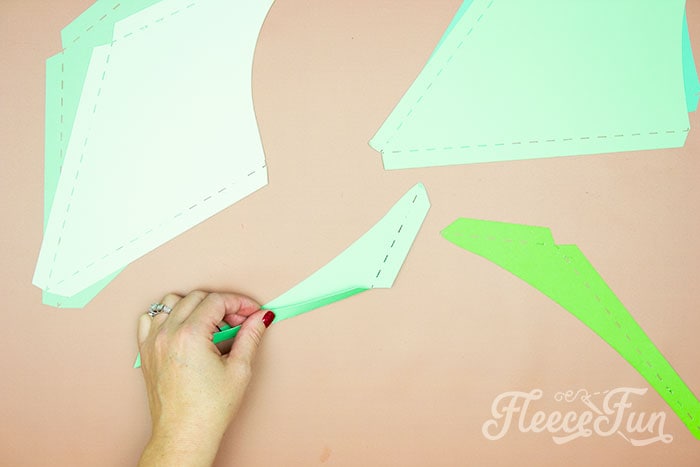 Folding the edges of giant holly leaves with fleecefun's free template and tutorial.