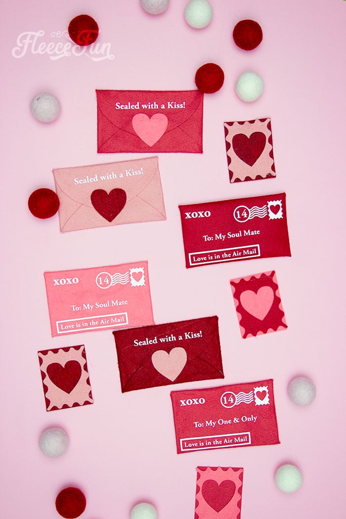 Handmade felt stamps added to enhance a Valentine envelope, following fleecefun's DIY guide.