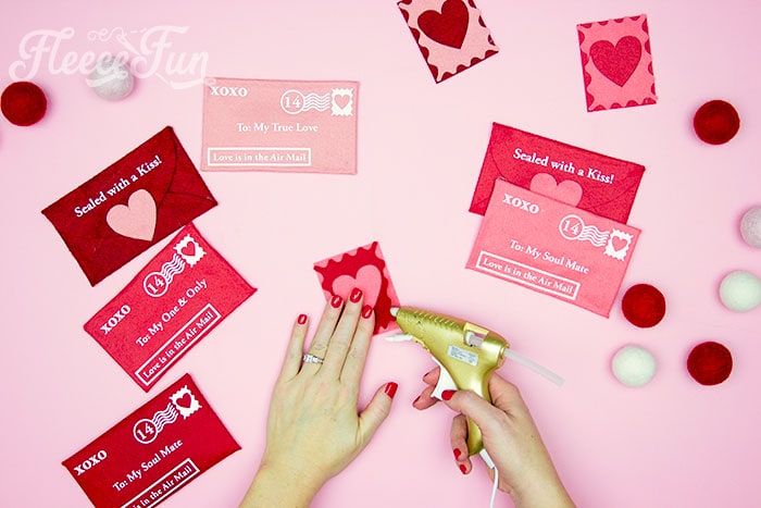 Creative felt stamp designs in progress for a Valentine envelope, using fleecefun's tutorial.